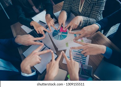 Top above high angle cropped close-up view of stylish sharks agent broker putting v-sign in round circle over desktop desk table charts diagram graph graphic data calculator work place station