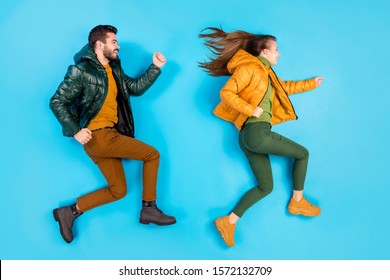 Top above high angle view full length body size photo of casual cute pretty couple of people running towards sale shop while lying  smiling toothily isolated pastel color blue background