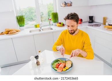 Top Above High Angle View Photo Of Young Man Cut Knife Fish Steak Dinner Dieting Calories Cuisine Indoors