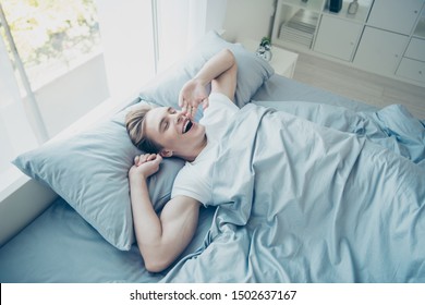 Top Above High Photo Of Positive Cheerful Brown Haired Man Awake From Healthy Sleep Yawn Feel Satisfied After Night Dreams In Room House Indoors