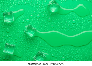 Top above overhead close up view photo of melting ice cubes on bright vivid color backdrop