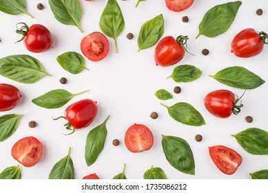 Top Above Overhead View Photo Of Basil Leaves Cherry Tomatoes And Peppercorns Isolated On White Background