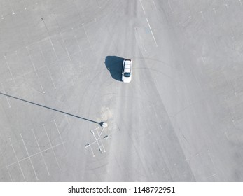 Top Aerial Abstract View Of Blue Car Running On Asphalt With Parking Lots Isolated Copy Space Design