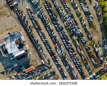 Top aerial view of auto auction many used car lot parked distributed in a parking. - Shutterstock ID 1826375108