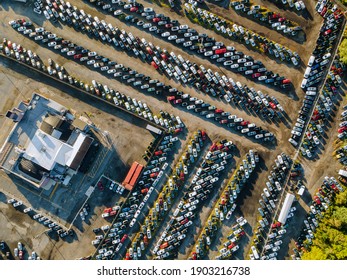 Top aerial view of auto auction many used car lot parked distributed in a parking. - Shutterstock ID 1903216738