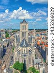 Top aerial view of Saint Nicholas Church Sint-Niklaaskerk Scheldt Gothic style building with tower in Ghent city historical centre Gent old town, East Flanders province, Flemish region, Belgium