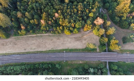 Top Aerial View Of Train Tracks Through German Forest Near Munich Aerial Drone View Fotage