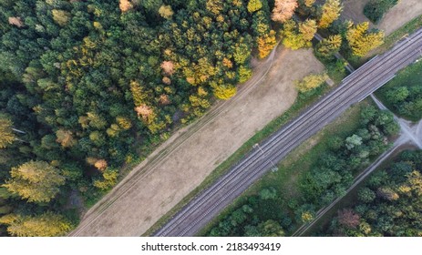 Top Aerial View Of Train Tracks Through German Forest Near Munich Aerial Drone View Fotage