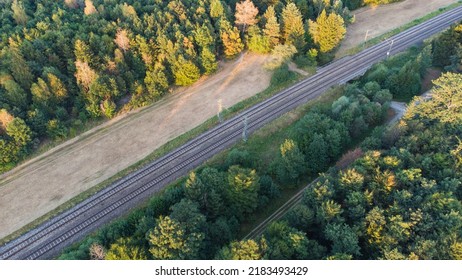 Top Aerial View Of Train Tracks Through German Forest Near Munich Aerial Drone View Fotage