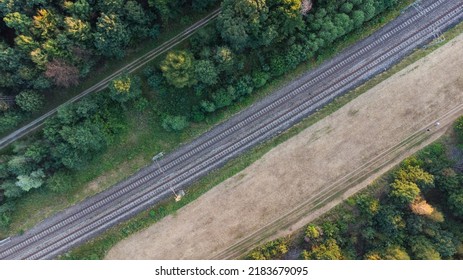 Top Aerial View Of Train Tracks Through German Forest Near Munich Aerial Drone View Fotage