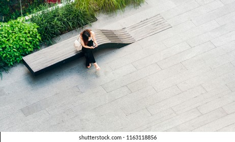 park bench top view images stock photos vectors shutterstock https www shutterstock com image photo top aerial view woman uses smartphone 1163118856