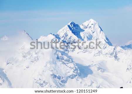 top of alps in sky