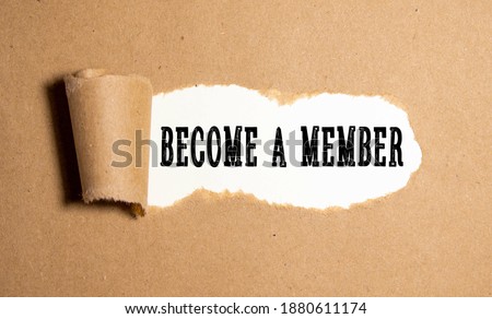 Top angle view of pen and notebook written with text BECOME A MEMBER. Business and education concept.