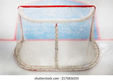 Top And Back View Of Hockey Goal With White Net - Ice And Hockey Markings - Empty Hockey Rink