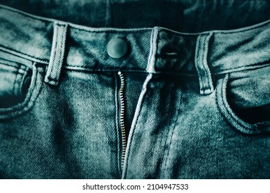 The Top Of Blue Fashionable Beautiful Jeans, With An Unbuttoned Zipper. Casual Branded Clothing. Favorite Trousers.