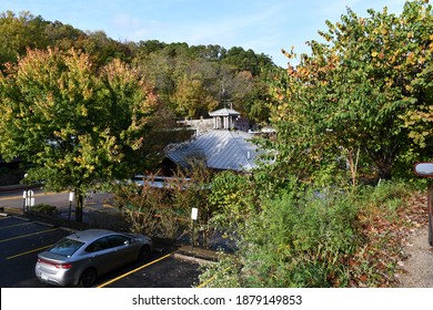 The Top Of A Building In Eureka Springs, Arkansas. There Is A Car Parked In A Parking Lot. Picture Taken On October 19th, 2020.