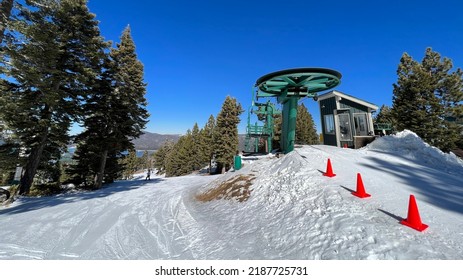 Top Of Chair Lift With Orange Cones To Mark Exit Path For Skiers And Snowboarders At Big Bear Mountain, California