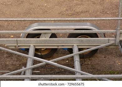 Top detail of a boat trailer with side wheels