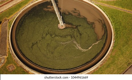 Top Down Aerial Drone Image Of A Sewage Treatment (water Reclamation) Plant In Guildford, England On A Sunny Day.