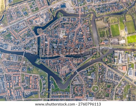 Top down aerial map view of Dokkum canal city Netherlands urban layout
