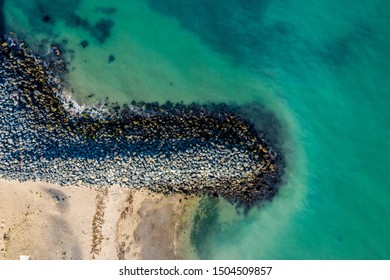Top down aerial view of Breakwater and sea in Bray , Ireland.