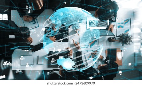 Top down aerial view of businesswoman sit at seat and analyze global network with business team. Group of diverse business people planning marketing strategy while using big data cloud. Directorate. - Powered by Shutterstock