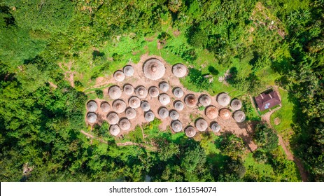 Top Down Aerial View Of Circular Indigenous  Huts In Colombia