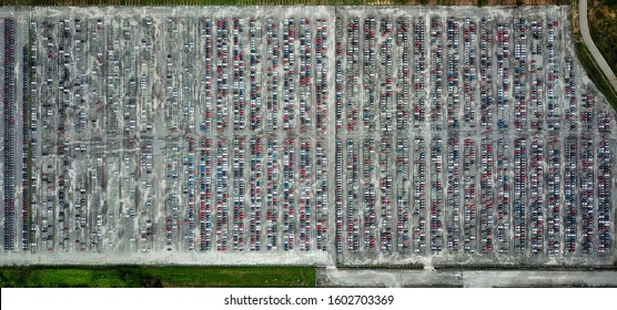 Top Down Aerial View Of A Crowded Car Park Captured By Drone.