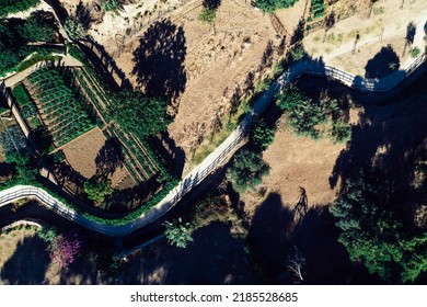 Top Down Aerial View Of Hiking Path At Ribeira Das Vinhas In Cascais, Portugal - Translated To Vineyards Trail