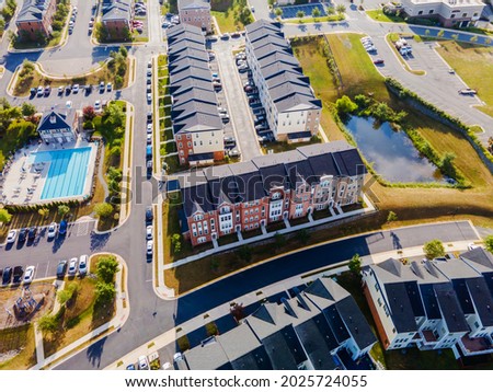 Top down aerial view of urban houses and streets in a residential area of Ashburn. Virginia, USA