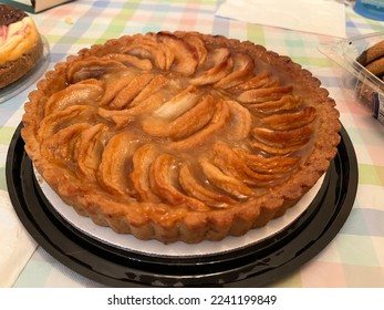 The top down, close up view of a French apple tart.