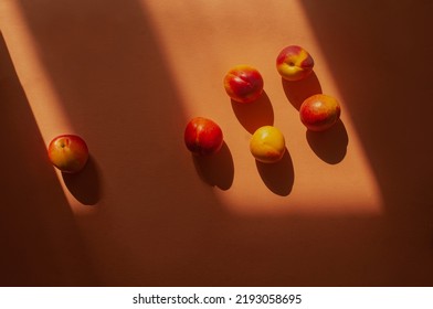 Top Down Flat Lay Orange Colorful Shot  Peaches And Shadow Summer Food Concept