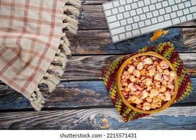 Top Down Flatlay, With Flavored Popcorn In A Bowl, Keyboard, And Plaid Fabric Towel, Useful For Blogger Concepts, Cozy, And Work Life Balance