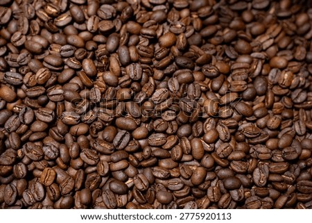 Top Down Full Frame Texture of Freshly Roasted Aromatic Coffee Beans