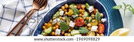 Similar – Mediterranean lunch or dinner with roasted dorado fishes, homemade focaccia bread , olive oil and olives served on rustic table with tableware and kitchen utensils, top view.