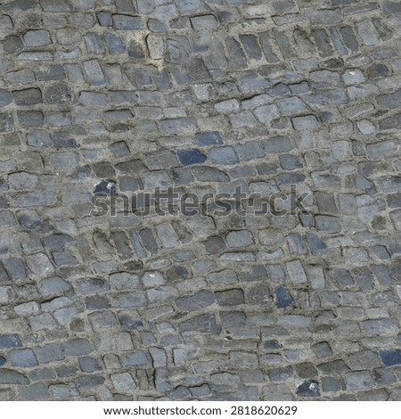 Top down seamless texture showing rustic grey stone cobblestone setts with uneven mortar joints in an old European style layout.