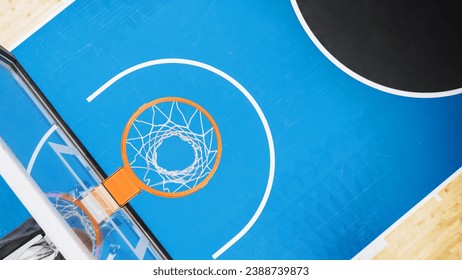 Top Down Shot Of Basketball Hoop At Sports Court In International Arena. Empty Playing Field Where Professional Matches And Games Are Held Awaiting For Begining Of Tournament, Players to Come Out. - Powered by Shutterstock