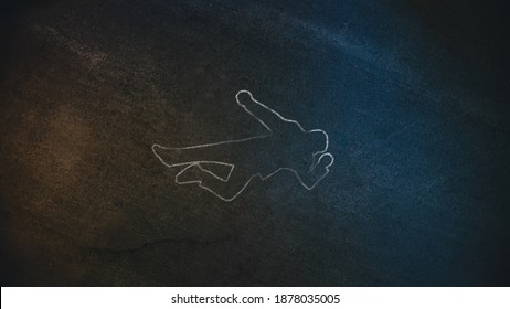 Top Down Shot of a Chalk Body Outline on the Pavement Symbolizing a Crime Scene Done on a Street at Night. Forensic science investigate Horrbile Murder with Death.