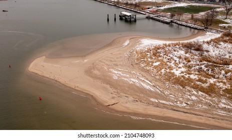 A Top Down Shot Over The Shores Of Coney Island Creek After Snow Fall On A Cloudy Day.