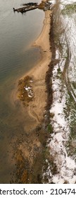 A Top Down Shot Over The Shores Of Coney Island Creek After Snow Fall On A Cloudy Day.