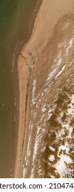 A Top Down Shot Over The Shores Of Coney Island Creek After Snow Fall On A Cloudy Day.