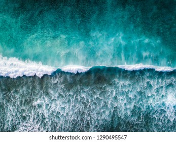 Top down shot of a wave breaking 