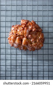 A Top Down View Of An Apple Fritter.