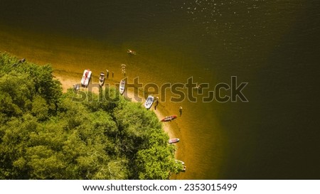 Top down view of beach on lake Sec with recreational vessels. Popular tourist summer destination in Pardubicky kraj, Czech republic, European union.