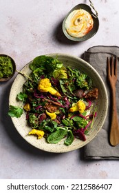 Top Down View Of A Beautiful Middle Eastern Fattoush Salad With Cauliflower On Light Background