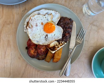 Top down view of British breakfast in a cafe - Shutterstock ID 2234448355