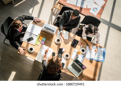 Top Down View Of Business People Have Business Meeting In Meeting Room In Business Office