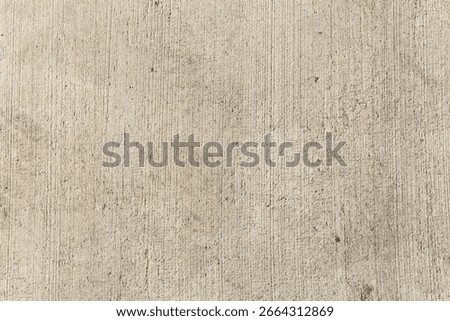A top down view of a cement surface, as a background.