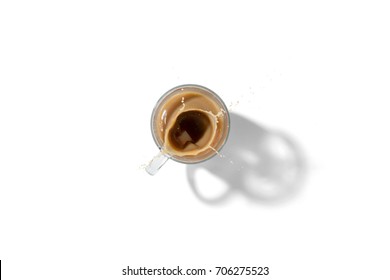 Top Down View Of Coffee Splash In White Ceramic Coffee Cup Isolated On White Background