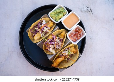 Top Down View Of Delicious Fish Tacos With Guacamole And Salsa,, White Background, No People ,copy Space